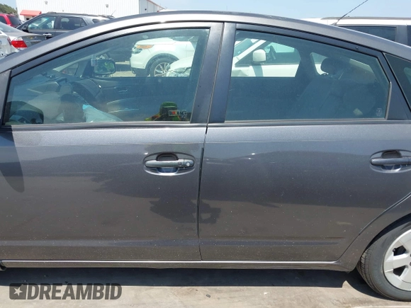 2007 Toyota Prius z VIN JTDKB20U173242693, wystawiony jako IAAI lot #42310546 z przebiegiem 250 887 mil mil oraz . Historia ofert i sprzedaży dostępna na DreamBid. Obrazek 14.