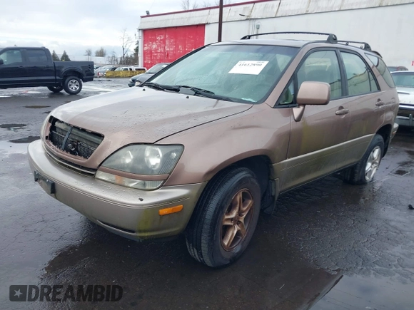1999 Lexus RX 300 Luxury SUV with VIN JT6HF10U5X0061520, listed as a IAAI auction lot 41612890 with 254,864 mi miles. Bid and sale history available at carsss.com. Image 2.