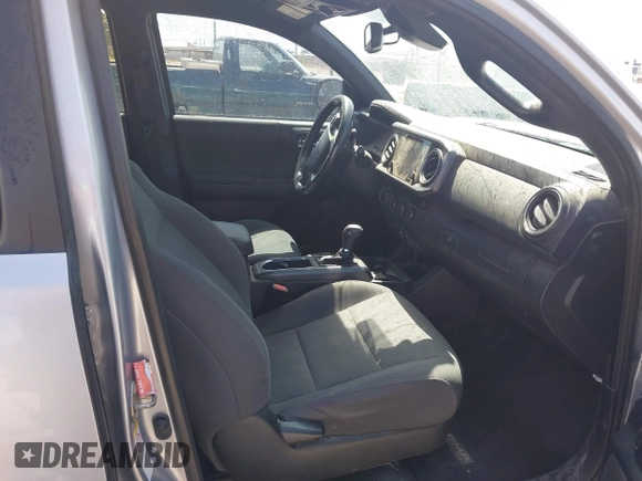 2018 Toyota Tacoma SR with VIN 3TMCZ5AN3JM170037, listed as a IAAI auction lot 42565385 with 157,450 mi miles and . Bid and sale history available at DreamBid. Image 5.
