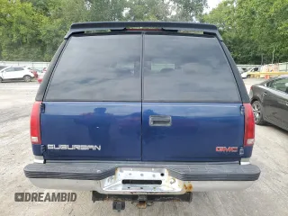 1999 GMC Suburban z VIN 1GKGK26J6XJ771768, wystawiony jako Copart lot #66300974 z przebiegiem 181 048 mil mil oraz Szkody całkowita. Historia ofert i sprzedaży dostępna na DreamBid. Obrazek 6.