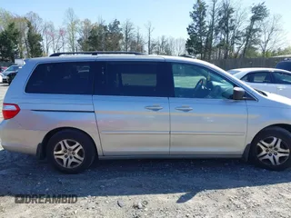 2007 Honda Odyssey EX-L with VIN 5FNRL387X7B080906, listed as a IAAI auction lot 41910061 with 229,717 mi miles and . Bid and sale history available at DreamBid. Image 13.