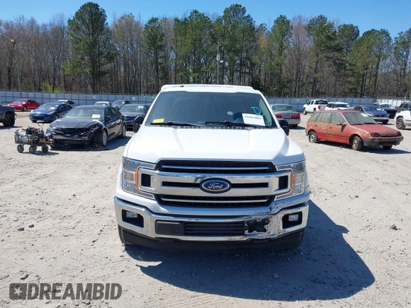 2018 Ford F-150 XL with VIN 1FTFX1C57JKF08037, listed as a IAAI auction lot 41863806 with 195,725 mi miles and . Bid and sale history available at DreamBid. Image 12.