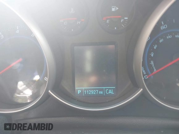 2014 Chevrolet Cruze 1LT with VIN 1G1PC5SB9E7180989, listed as a IAAI auction lot 42230408 with 112,927 mi miles and . Bid and sale history available at DreamBid. Image 7.