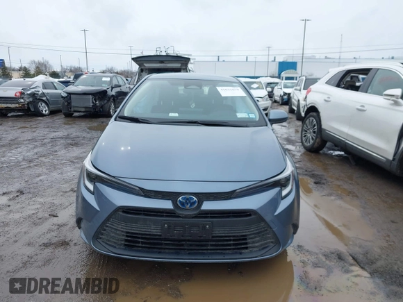 2023 Toyota Corolla Hybrid LE with VIN JTDBDMHE0P3005163, listed as a IAAI auction lot 41631670 with 10,956 mi miles. Bid and sale history available at carsss.com. Image 12.