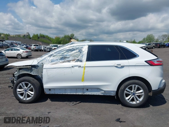 2020 Ford Edge SEL z VIN 2FMPK4J95LBA31157, wystawiony jako IAAI lot #42225863 z przebiegiem 96 082 mil mil oraz . Historia ofert i sprzedaży dostępna na DreamBid. Obrazek 14.