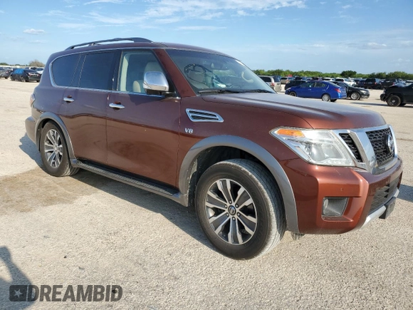 2017 Nissan Armada SL with VIN JN8AY2ND8H9010517, listed as a Copart auction lot 61785834 with 142,157 mi miles and Salvage Title. Bid and sale history available at carsss.com. Image 4.