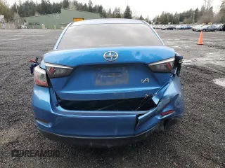 2016 Scion iA z VIN 3MYDLBZVXGY142781, wystawiony jako Copart lot #51987175 z przebiegiem 129 288 mil mil oraz Nie do naprawy • Non repairable. Historia ofert i sprzedaży dostępna na DreamBid. Obrazek 6.