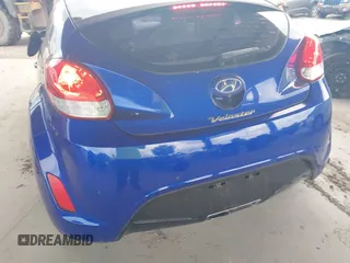 2012 Hyundai Veloster w/Gray Int z VIN KMHTC6AD0CU034683, wystawiony jako IAAI lot #42395112 z przebiegiem 134 388 mil mil oraz . Historia ofert i sprzedaży dostępna na DreamBid. Obrazek 16.