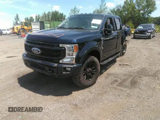 2022 Ford F-250 XL with VIN 1FT7W2BNXNEF72205, listed as a IAAI auction lot 39828317 with 20,213 mi miles and . Bid and sale history available at DreamBid. Image 2.