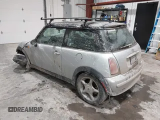 2002 MINI Hardtop with VIN WMWRC33422TC37296, listed as a IAAI auction lot 41385046 with 107,663 mi miles and . Bid and sale history available at DreamBid. Image 3.