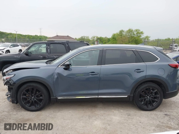2023 Mazda CX-9 Grand Touring with VIN JM3TCBDY2P0636226, listed as a IAAI auction lot 42384360 with 161,352 mi miles and . Bid and sale history available at DreamBid. Image 15.