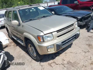 1999 Infiniti QX4 z VIN JNRAR05Y3XW048978, wystawiony jako IAAI lot #42519583 z przebiegiem 248 365 mil mil oraz . Historia ofert i sprzedaży dostępna na DreamBid. Obrazek 1.