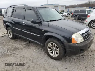 2004 Suzuki XL7 LX z VIN JS3TX92V344110661, wystawiony jako Copart lot #43613315 z przebiegiem 143 334 mil mil oraz Szkoda całkowita • Salvage title. Historia ofert i sprzedaży dostępna na DreamBid. Obrazek 4.