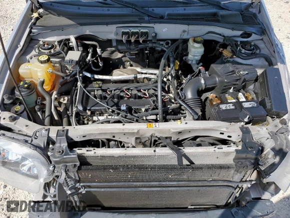 2007 Ford Escape XLS with VIN 1FMYU02Z87KB60530, listed as a Copart auction lot 61273345 with 57,574 mi miles and Salvage title. Bid and sale history available at DreamBid. Image 12.