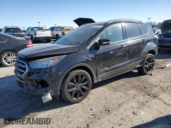 2017 Ford Escape Titanium with VIN 1FMCU9JD0HUC74354, listed as a Copart auction lot 42356345 with 184,816 mi miles and Salvage Title. Bid and sale history available at carsss.com. Image 1.