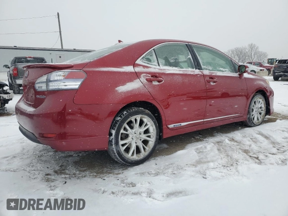 2010 Lexus HS 250h with VIN JTHBB1BA9A2005121, listed as a Copart auction lot 87825175 with 124,594 mi miles and Salvage Title. Bid and sale history available at DreamBid. Image 3.