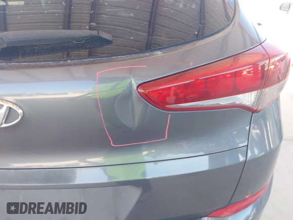 2017 Hyundai Tucson SE with VIN KM8J33A4XHU438510, listed as a IAAI auction lot 42021812 with 117,848 mi miles. Bid and sale history available at carsss.com. Image 17.