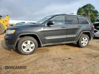2011 Jeep Grand Cherokee Laredo z VIN 1J4RR4GG0BC518726, wystawiony jako Copart lot #58985765 z przebiegiem 163 625 mil mil oraz Szkoda całkowita • Salvage title. Historia ofert i sprzedaży dostępna na DreamBid. Obrazek 1.