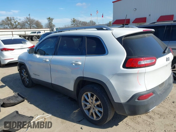 2016 Jeep Cherokee Limited with VIN 1C4PJLDB8GW256788, listed as a IAAI auction lot 41657339 with 104,630 mi miles. Bid and sale history available at carsss.com. Image 3.