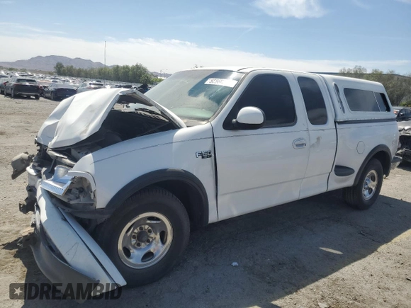 1999 Ford F-150 XL with VIN 1FTZX0726XKA98752, listed as a Copart auction lot 58986695 with Not provided miles and Salvage title. Bid and sale history available at DreamBid. Image 1.