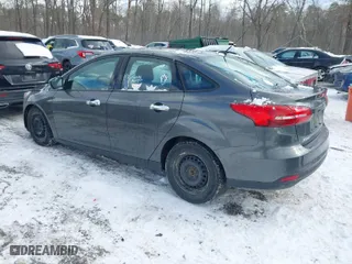 2016 Ford Focus S with VIN 1FADP3E24GL393007, listed as a IAAI auction lot 41522844 with 91,800 mi miles. Bid and sale history available at carsss.com. Image 3.