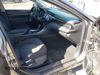 2019 Toyota Camry LE with VIN 4T1B11HK2KU240465, listed as a IAAI auction lot 42095075 with 67,852 mi miles and . Bid and sale history available at DreamBid. Image 5.