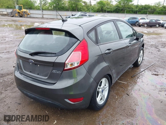 2018 Ford Fiesta SE with VIN 3FADP4EJ7JM130027, listed as a IAAI auction lot 42171799 with 65,253 mi miles and . Bid and sale history available at DreamBid. Image 4.