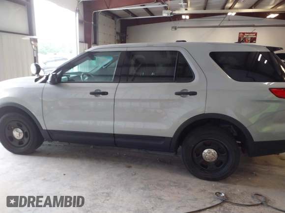 2013 Ford Police Interceptor Utility z VIN 1FM5K8AR8DGA68521, wystawiony jako IAAI lot #42063404 z przebiegiem 84 716 mil mil oraz . Historia ofert i sprzedaży dostępna na DreamBid. Obrazek 14.