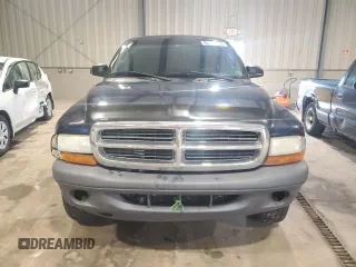 2004 Dodge Dakota z VIN 1D7GG16KX4S586053, wystawiony jako Copart lot #60221585 z przebiegiem 150 150 mil mil oraz Szkoda całkowita • Salvage title. Historia ofert i sprzedaży dostępna na DreamBid. Obrazek 5.