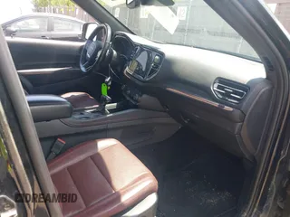 2023 Dodge Durango GT Plus with VIN 1C4RDJDGXPC688087, listed as a IAAI auction lot 42685018 with 58,999 mi miles and . Bid and sale history available at DreamBid. Image 5.