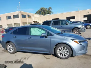 2023 Toyota Corolla Hybrid LE with VIN JTDBCMFEXP3006343, listed as a IAAI auction lot 41056503 with 121,690 mi miles. Bid and sale history available at carsss.com. Image 13.