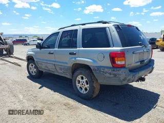 2000 Jeep Grand Cherokee Laredo with VIN 1J4GW48S8YC172274, listed as a IAAI auction lot 39738087 with 335,809 mi miles and . Bid and sale history available at DreamBid. Image 3.