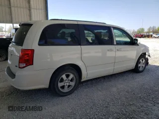 2013 Dodge Grand Caravan SXT with VIN 2C4RDGCG5DR554126, listed as a Copart auction lot 52160805 with 201,161 mi miles and Salvage Title. Bid and sale history available at DreamBid. Image 3.
