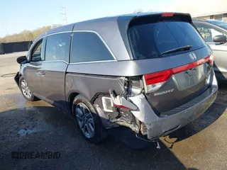 2015 Honda Odyssey Touring Elite z VIN 5FNRL5H9XFB067679, wystawiony jako IAAI lot #41913306 z przebiegiem 199 482 mil mil oraz . Historia ofert i sprzedaży dostępna na DreamBid. Obrazek 3.