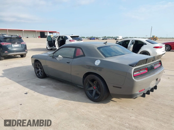 2017 Dodge Challenger R/T with VIN 2C3CDZBT8HH666130, listed as a IAAI auction lot 42173702 with 94,857 mi miles and . Bid and sale history available at DreamBid. Image 3.