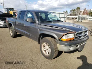 2004 Dodge Dakota Sport z VIN 1D7HG38N64S688604, wystawiony jako Copart lot #79811934 z przebiegiem 160 377 mil mil oraz Szkoda całkowita • Salvage title. Historia ofert i sprzedaży dostępna na DreamBid. Obrazek 4.