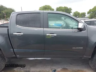2017 Chevrolet Colorado 4WD LT z VIN 1GCGTCEN8H1304906, wystawiony jako IAAI lot #42652360 z przebiegiem 140 093 mil mil oraz . Historia ofert i sprzedaży dostępna na DreamBid. Obrazek 13.
