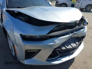 2017 Chevrolet Camaro 1LT z VIN 1G1FB1RS0H0146367, wystawiony jako IAAI lot #42343908 z przebiegiem 82 747 mil mil oraz . Historia ofert i sprzedaży dostępna na DreamBid. Obrazek 6.