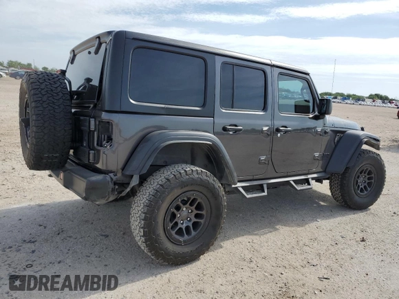 2023 Jeep Wrangler Willys with VIN 1C4HJXDGXPW526093, listed as a Copart auction lot 56818935 with 24,021 mi miles and Salvage title. Bid and sale history available at DreamBid. Image 3.