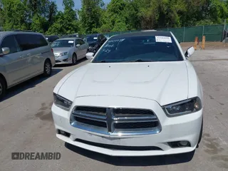 2014 Dodge Charger SE with VIN 2C3CDXBG2EH258886, listed as a IAAI auction lot 42104999 with 185,723 mi miles. Bid and sale history available at carsss.com. Image 12.