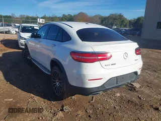 2018 Mercedes-Benz GLC with VIN WDC0J4KB2JF329875, listed as a IAAI auction lot 40844609 with 133,266 mi miles. Bid and sale history available at carsss.com. Image 3.
