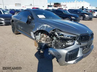 2020 BMW M8 with VIN WBSAE0C02LCE17524, listed as a IAAI auction lot 41374594 with 48,197 mi miles. Bid and sale history available at carsss.com. Image 1.