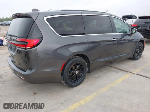 2021 Chrysler Pacifica Touring L z VIN 2C4RC1BG3MR574439, wystawiony jako IAAI lot #42190695 z przebiegiem 104 188 mil mil oraz . Historia ofert i sprzedaży dostępna na DreamBid. Obrazek 4.