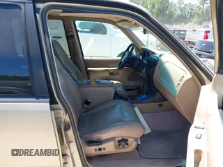 2000 Ford Explorer XLT z VIN 1FMZU73E4YZB70571, wystawiony jako IAAI lot #42317419 z przebiegiem 233 858 mil mil oraz . Historia ofert i sprzedaży dostępna na DreamBid. Obrazek 5.