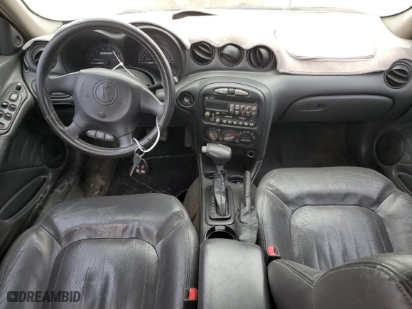 2004 Pontiac Grand Am GT with VIN 1G2NW52E84C154801, listed as a Copart auction lot 44636355 with 168,862 mi miles and Salvage Title. Bid and sale history available at carsss.com. Image 8.