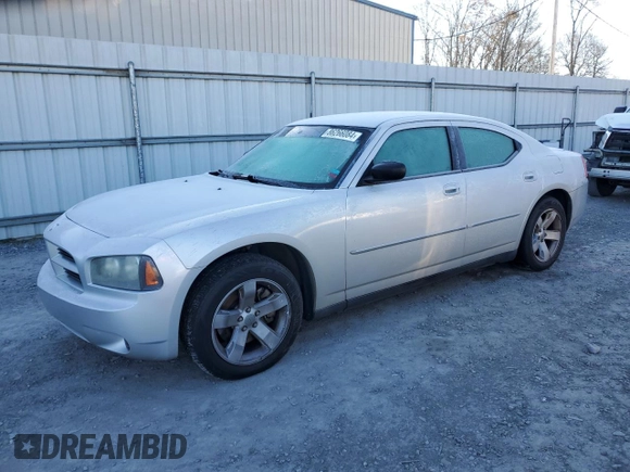 2009 Dodge Charger Police with VIN 2B3KA43TX9H587594, listed as a Copart auction lot 86266084 with 215,829 mi miles and Salvage Title. Bid and sale history available at DreamBid. Image 1.