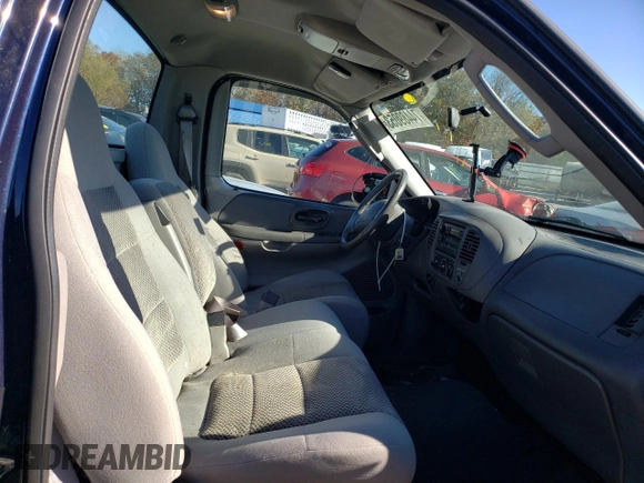 2003 Ford F-150 XL with VIN 1FTRF17L03NB45767, listed as a Copart auction lot 74489053 with 138,263 mi miles and Salvage Title. Bid and sale history available at DreamBid. Image 10.