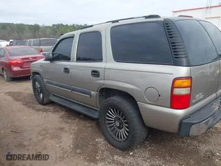 2003 Chevrolet Tahoe LS with VIN 1GNEC13V43R225216, listed as a IAAI auction lot 41535824 with 246,536 mi miles. Bid and sale history available at carsss.com. Image 3.