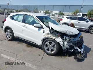 2021 Honda HR-V LX with VIN 3CZRU5H3XMM723617, listed as a IAAI auction lot 42450010 with 77,716 mi miles and . Bid and sale history available at DreamBid. Image 1.