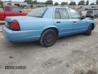 2004 Ford Police Interceptor Base w/3.27 Axle with VIN 2FAFP71W44X176595, listed as a Copart auction lot 72642164 with 136,019 mi miles and Salvage title. Bid and sale history available at DreamBid. Image 3.